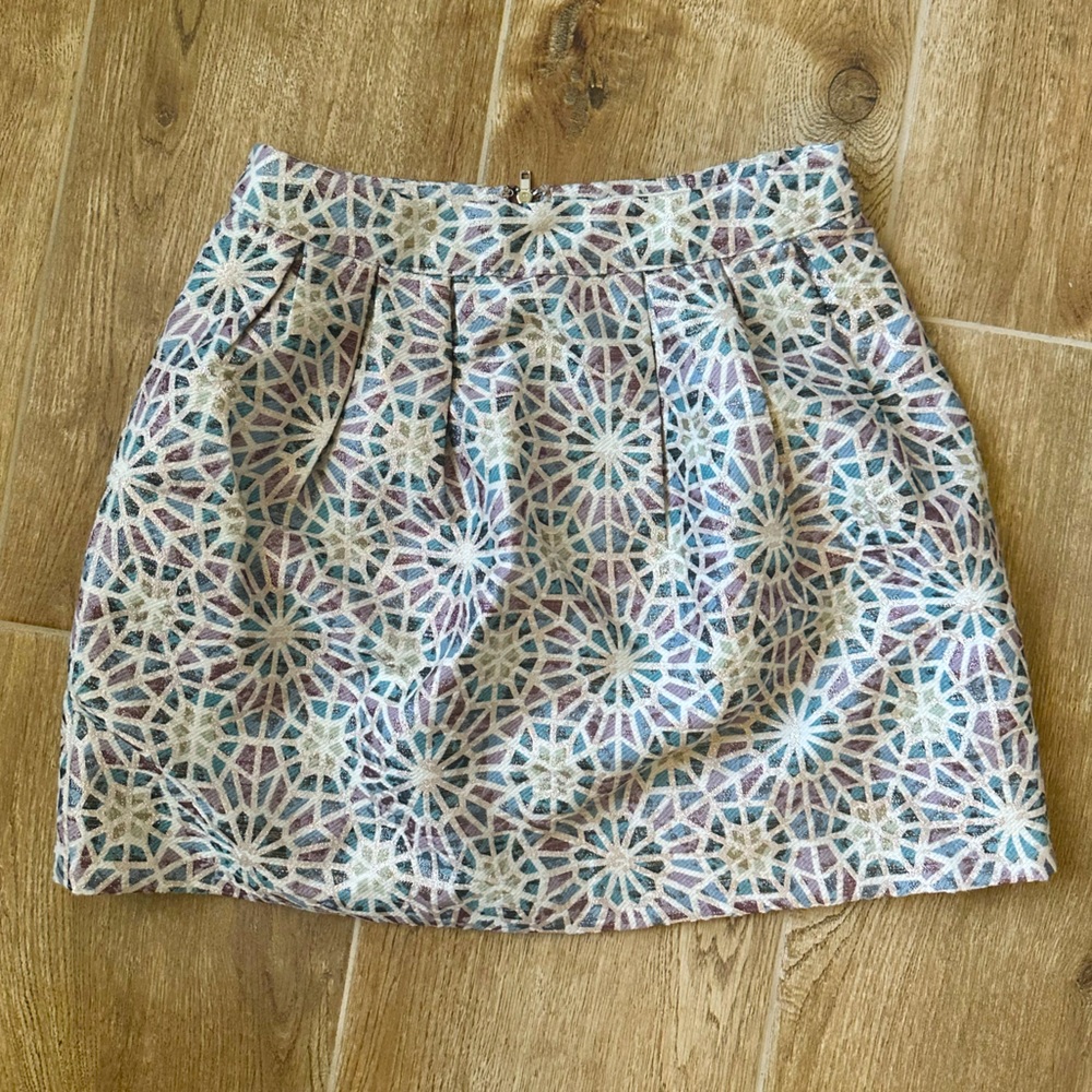 Size S Starburst pattern mini skirt